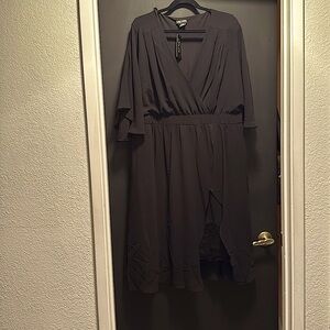 City, chic black dress with lace underneath.